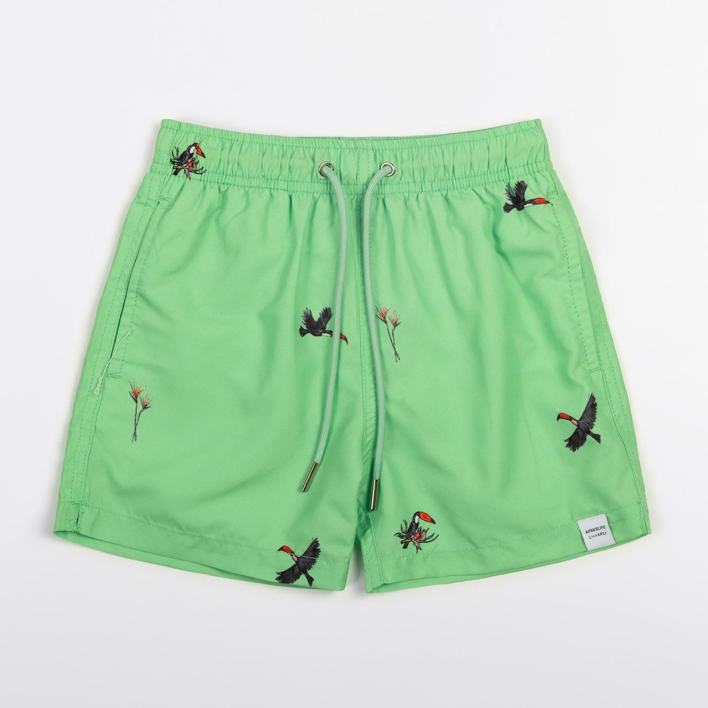 KIDS SWIM SHORTS KIDS JUNGLE in color GREEN - Front shot