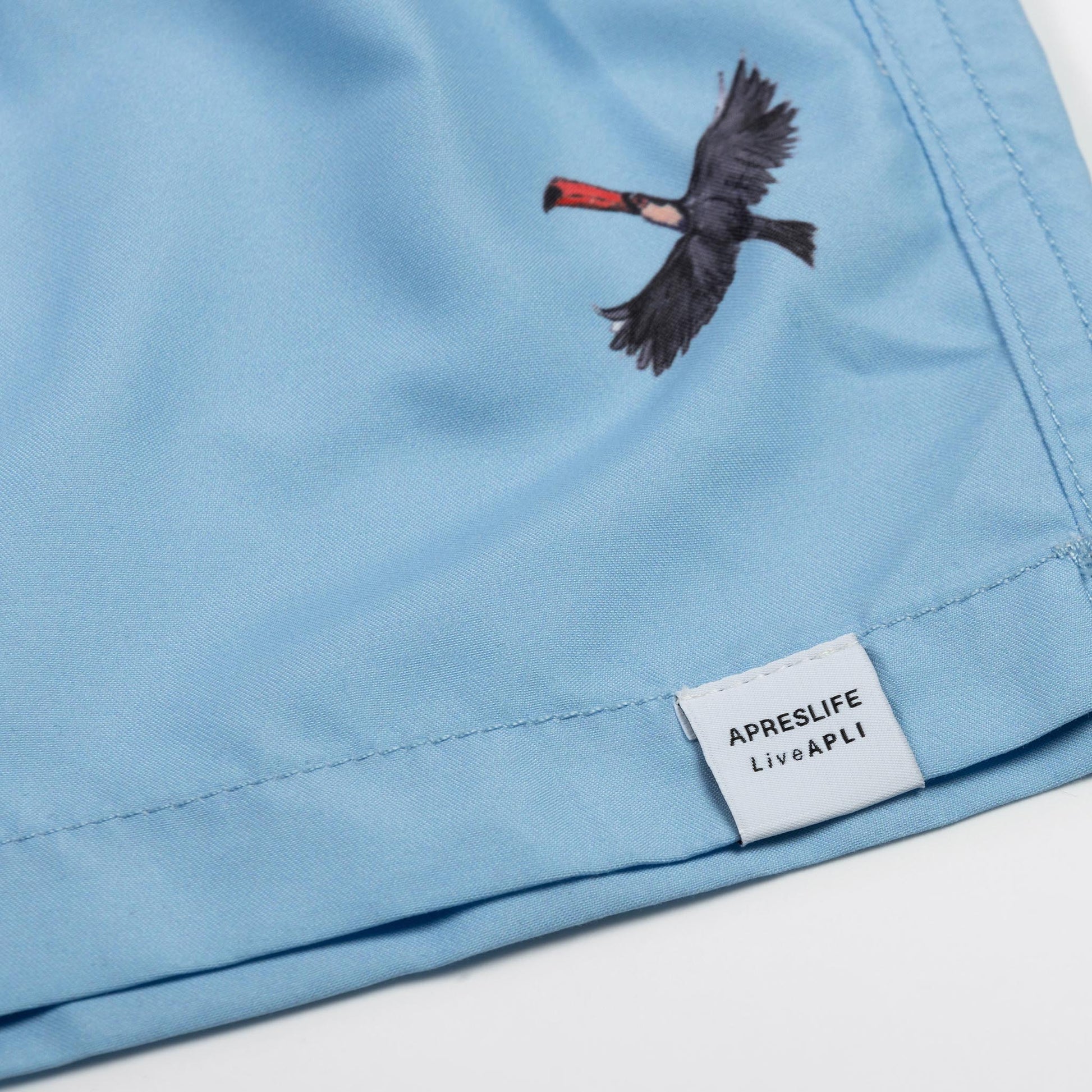 KIDS SWIM SHORTS KIDS DESERT in color SKY BLUE - Back shot