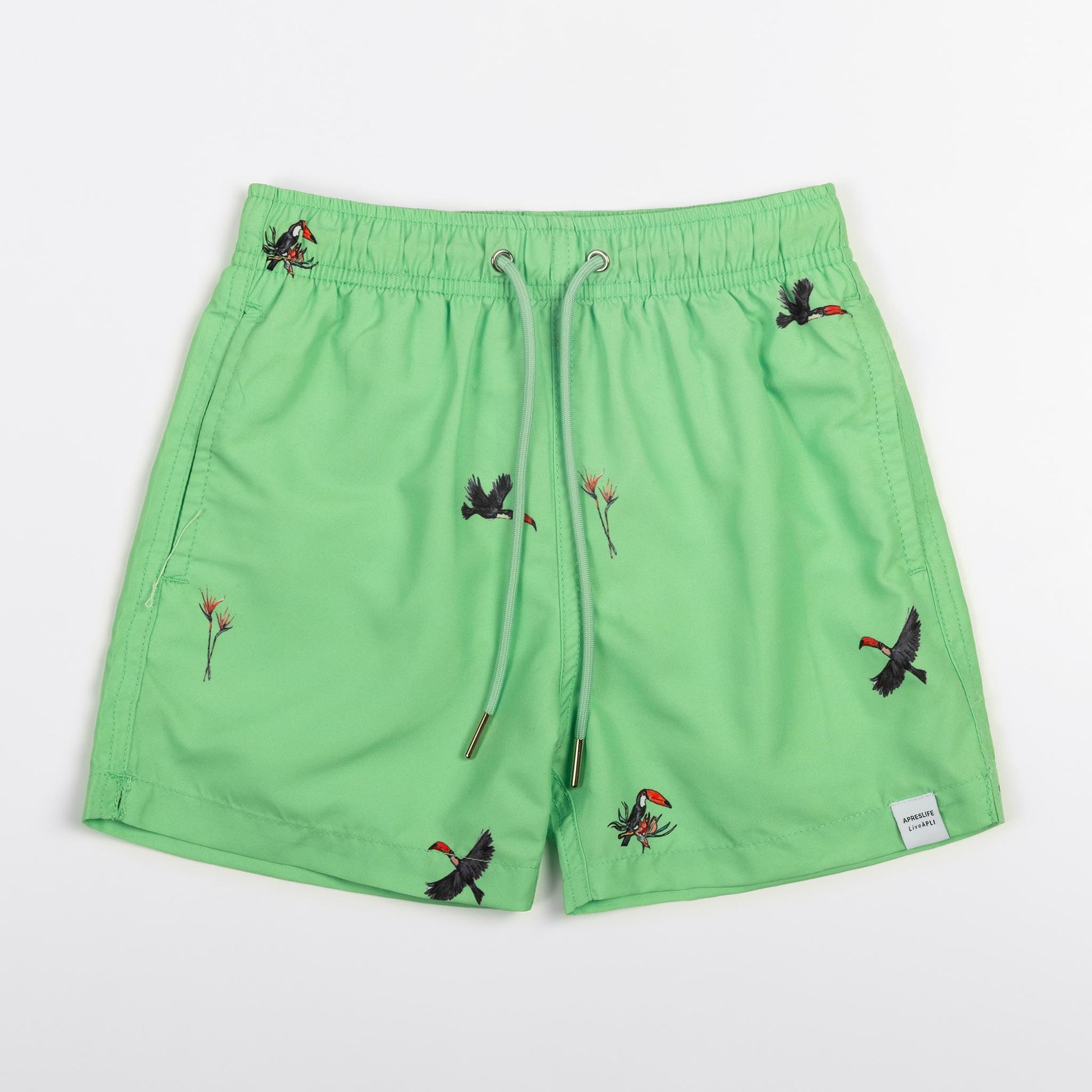KIDS SWIM SHORTS KIDS JUNGLE in color GREEN - Front shot