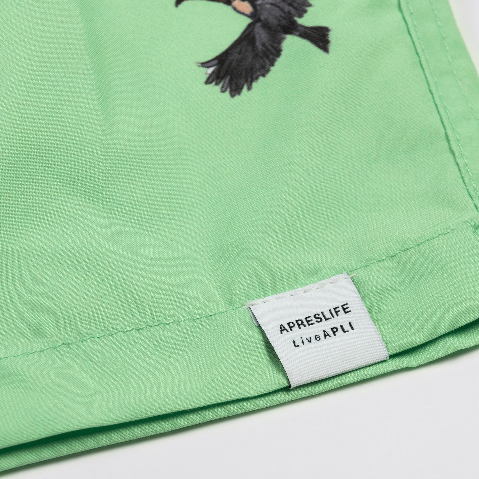KIDS SWIM SHORTS KIDS JUNGLE in color GREEN - Back shot